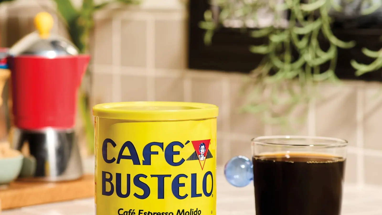 Café Bustelo Espresso Style Ground Coffee shown in a coffee-serving or brewing setting