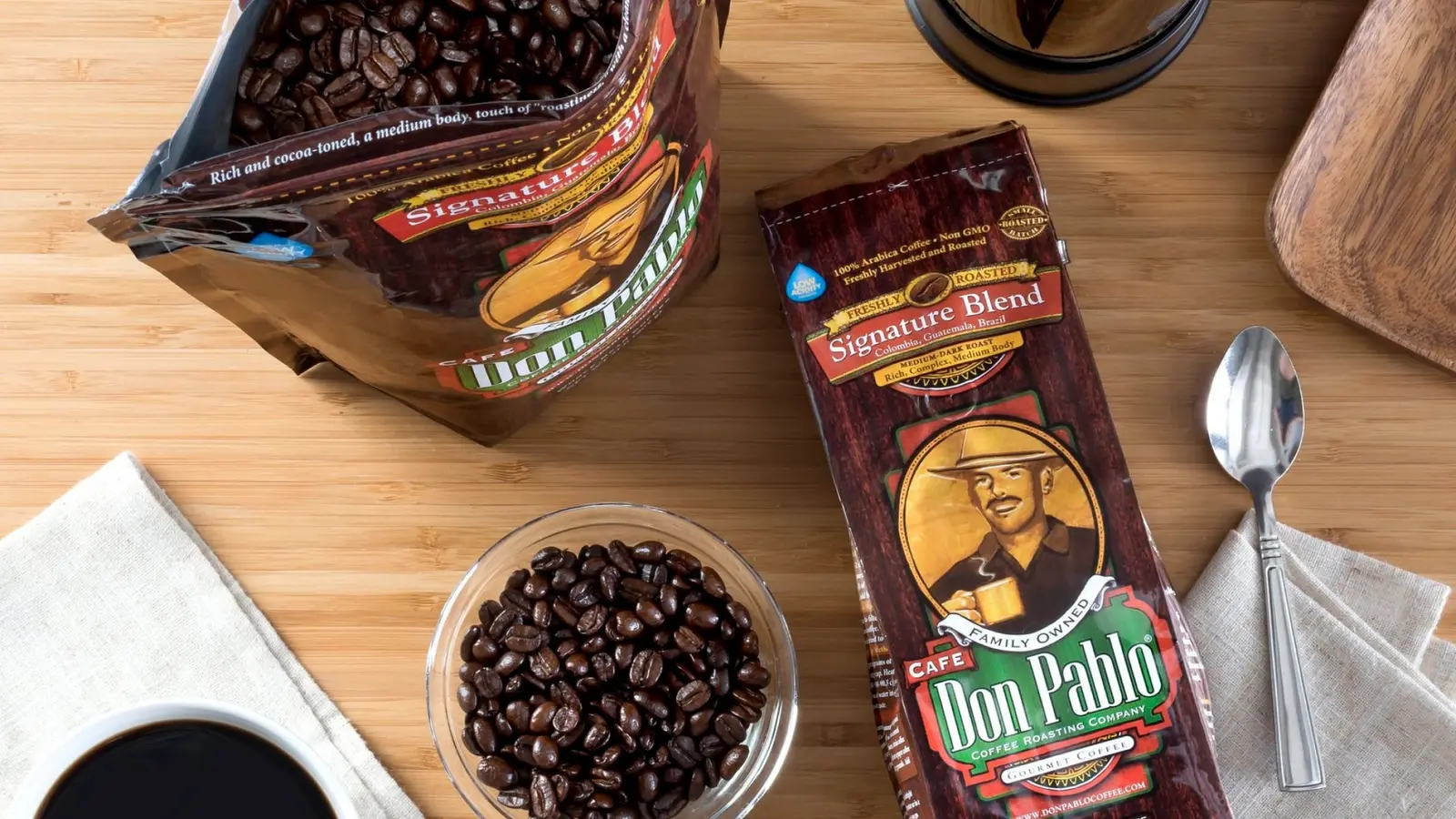 Cafe Don Pablo Signature Blend Whole Bean shown in a coffee-serving or brewing setting