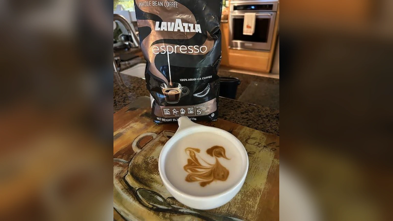 Lavazza Espresso whole-bean coffee beside freshly poured coffee