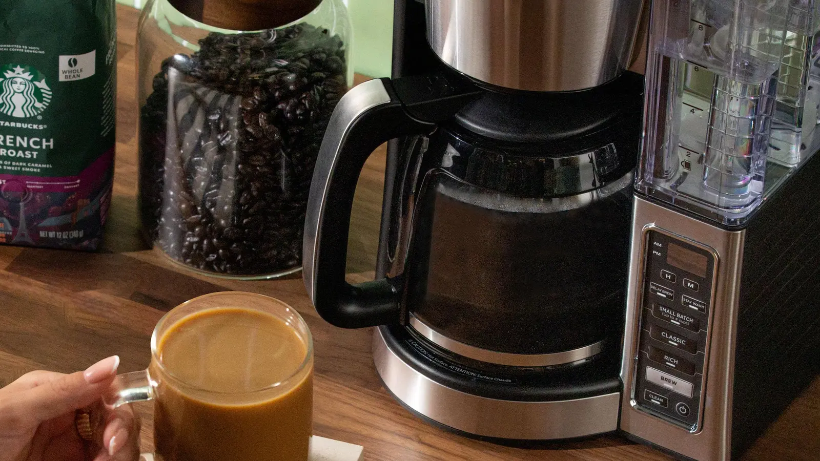 Starbucks French Roast Whole Bean shown in a coffee-serving or brewing setting