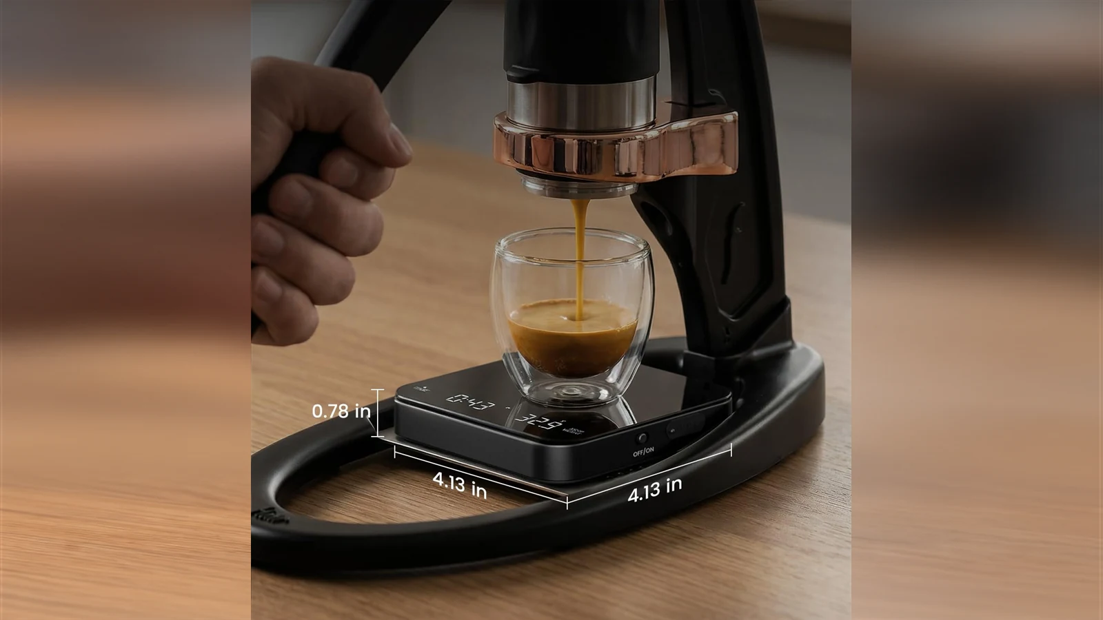 Maestri House S2 scale supporting a glass of espresso beneath a manual brewer