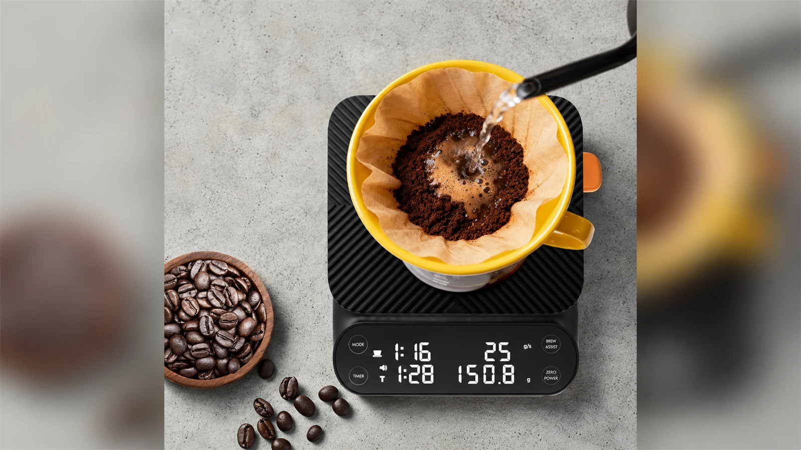 A kettle pouring water into a filter brewer on a Maestri House S3 coffee scale