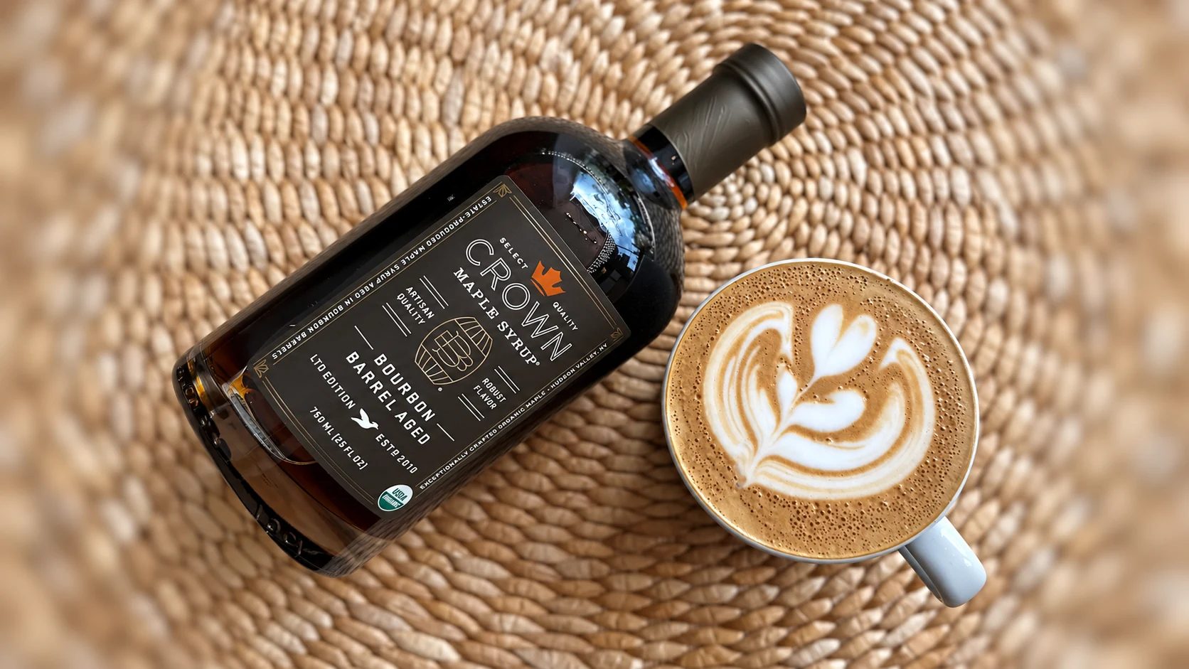 Bourbon Barrel Aged maple syrup beside a latte. The photograph shows 750 mL; the linked selection is 375 mL.