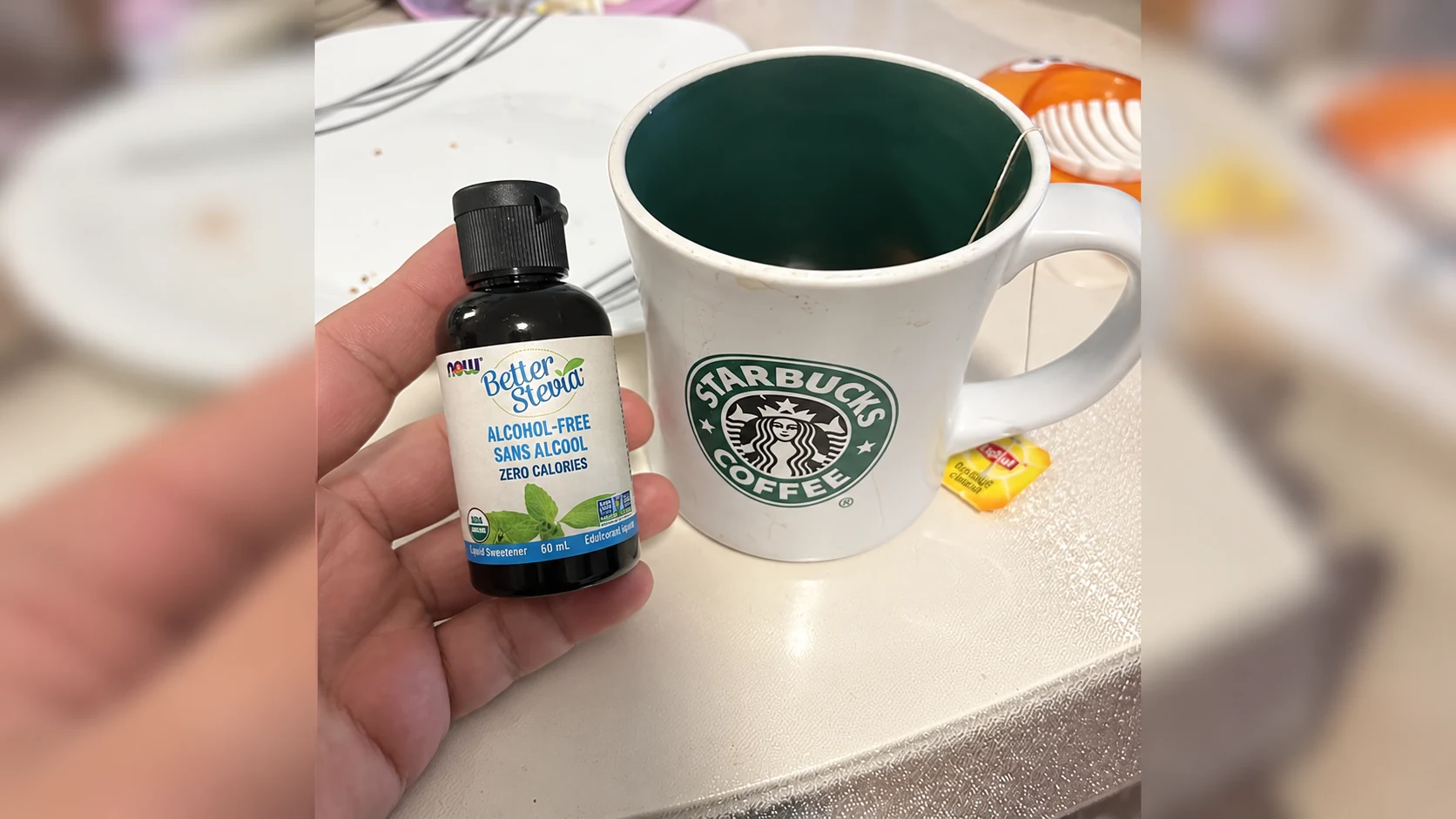 A customer’s 2 fl oz Alcohol-Free BetterStevia bottle beside tea illustrates the dispensing format. The linked choice is two 8 fl oz Organic Glycerite bottles.