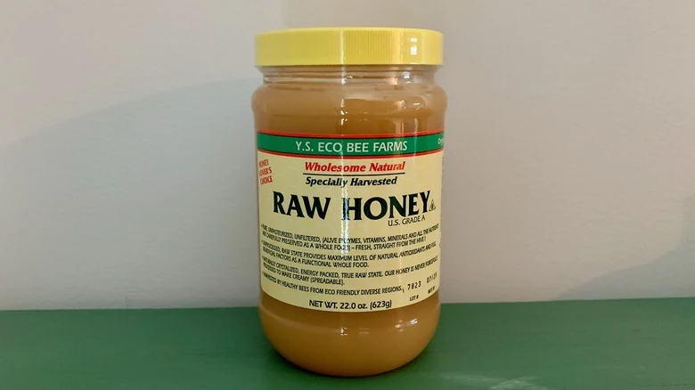 Y.S. Eco Bee Farms jar showing pale thick raw honey
