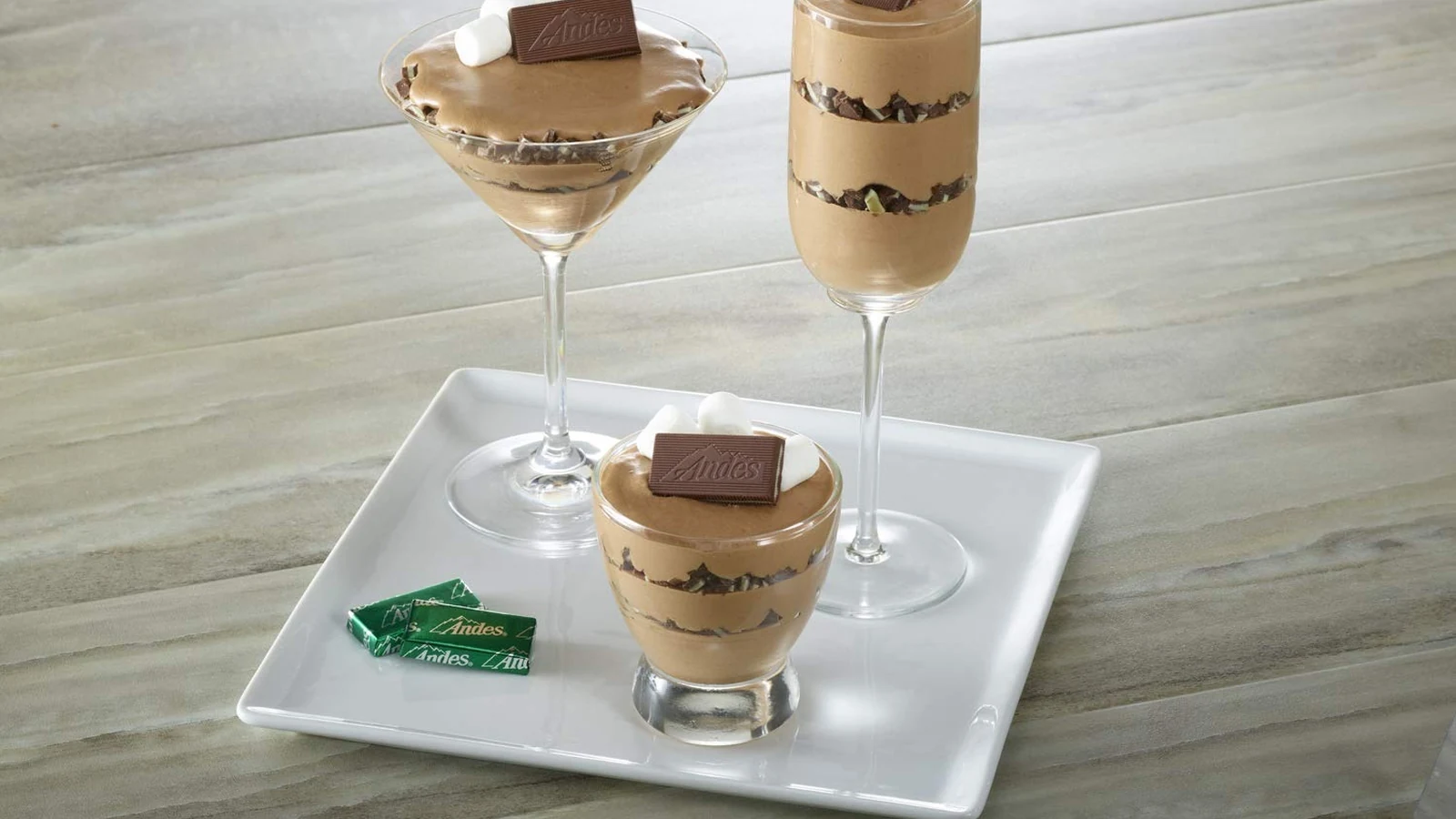 Andes mint chocolates served with layered cream desserts