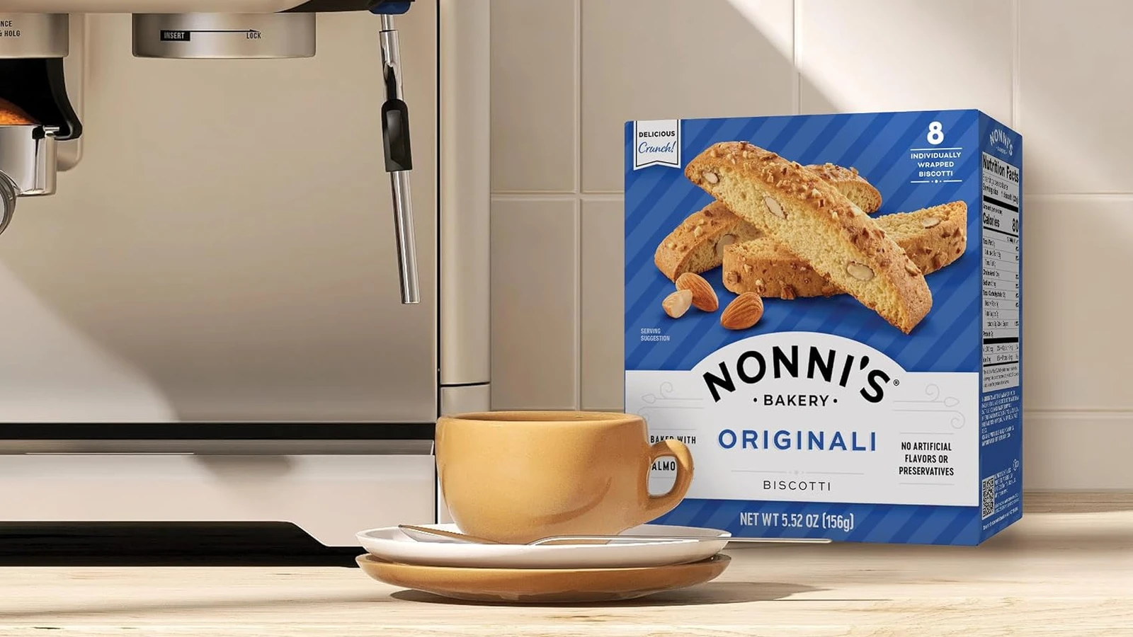 Nonni's Originali biscotti box beside an espresso machine and coffee cup