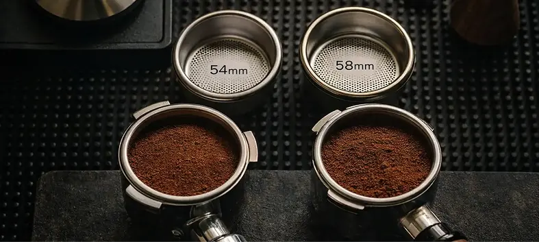 Bottomless portafilter pulling an espresso shot with a clear view of the extraction stream